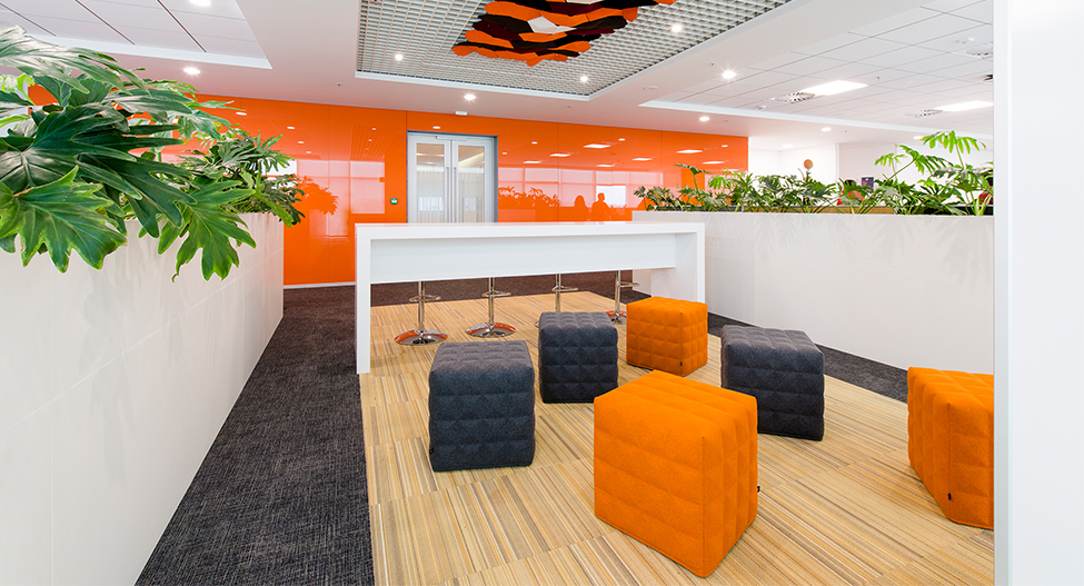 casual seating area with bright small seats and counter
