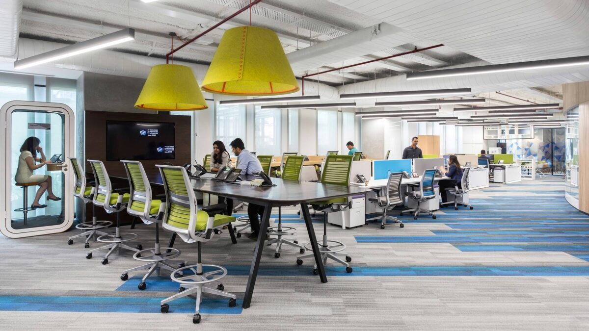 people working in open plan office