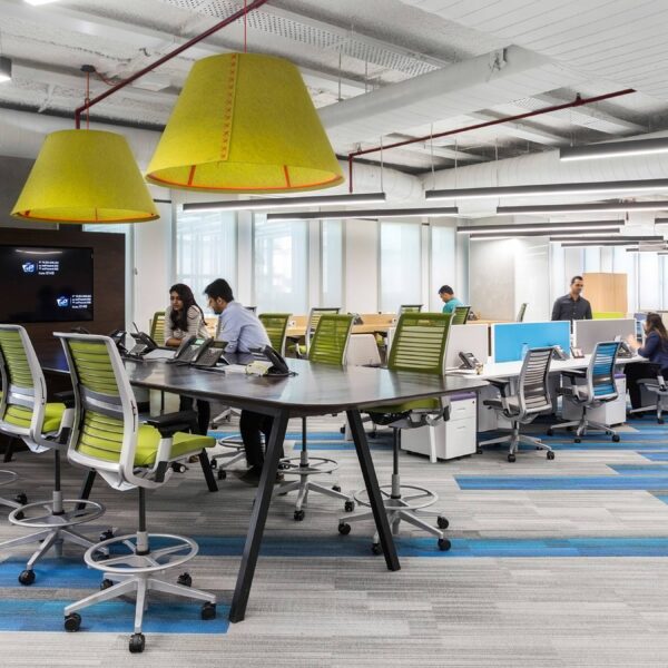 people working in open plan office