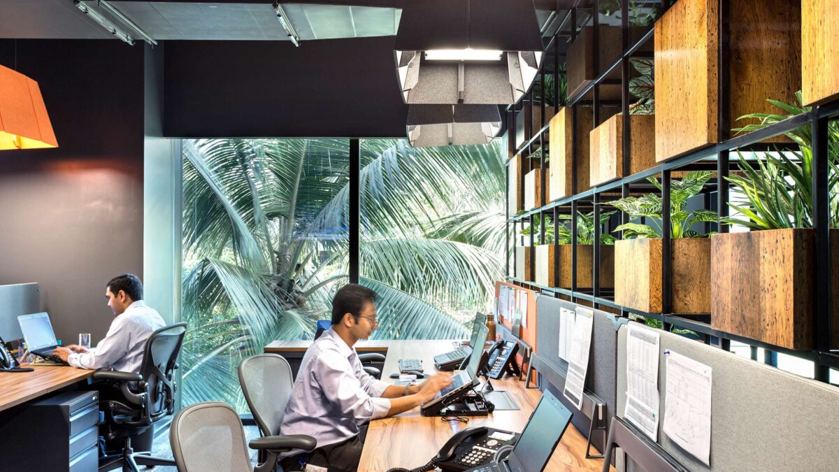 person focusing at open work desk