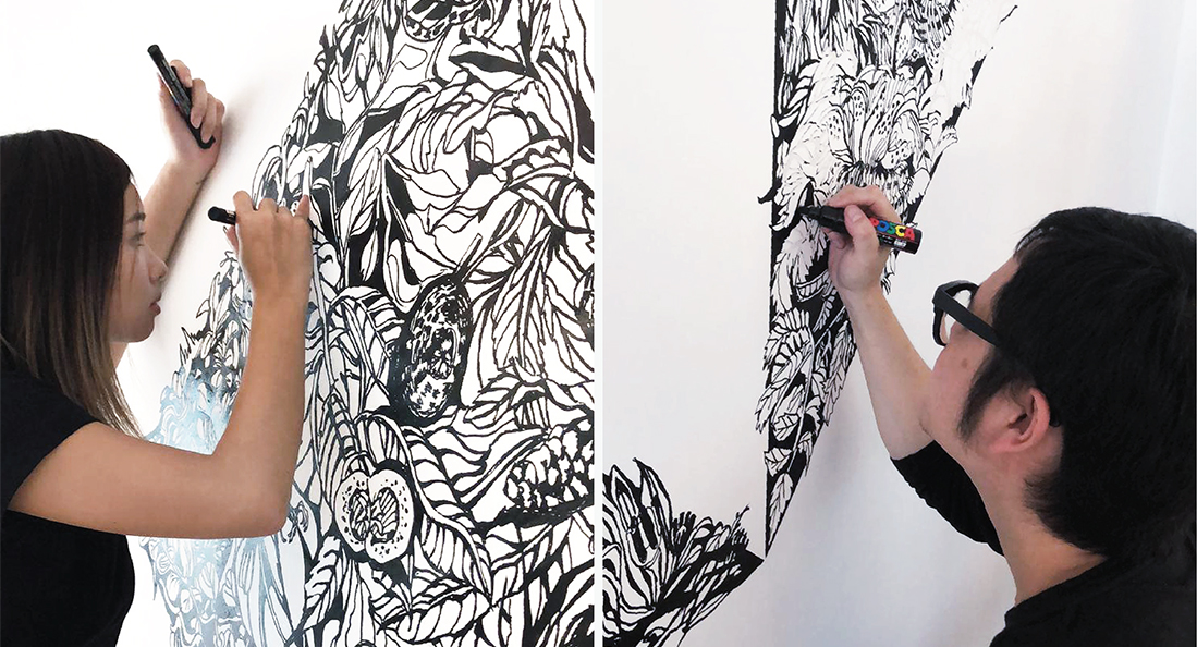 man and woman doing a bespoke black and white painting