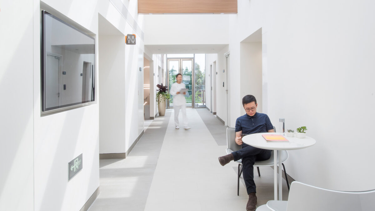 person waiting in corridor