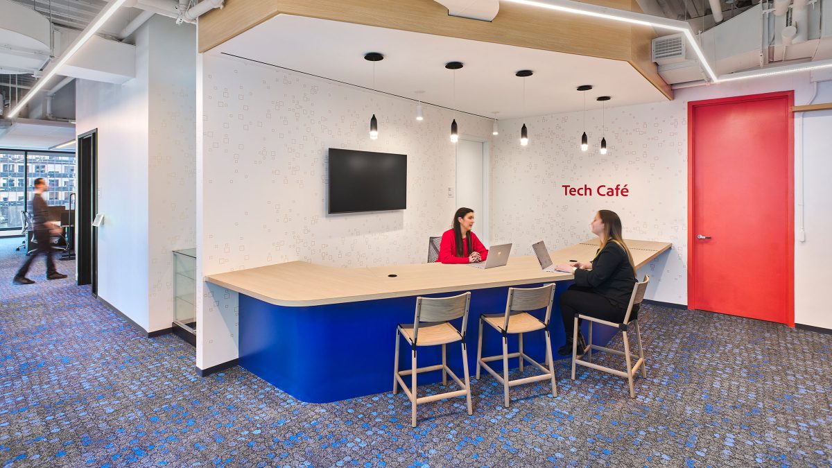 women collaborating at desk