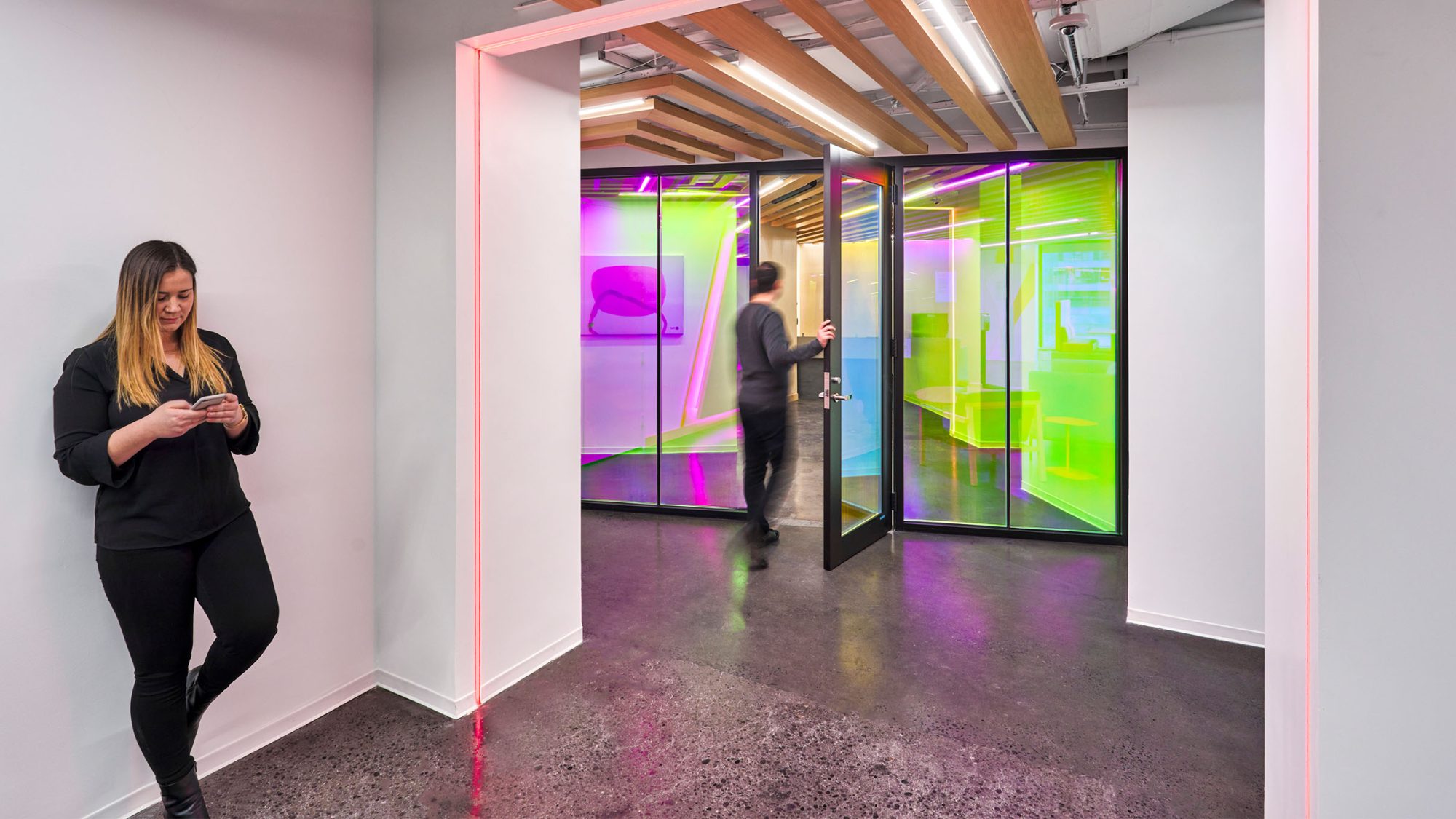 Software company office design in New York featuring a colourful brand and employee experience.