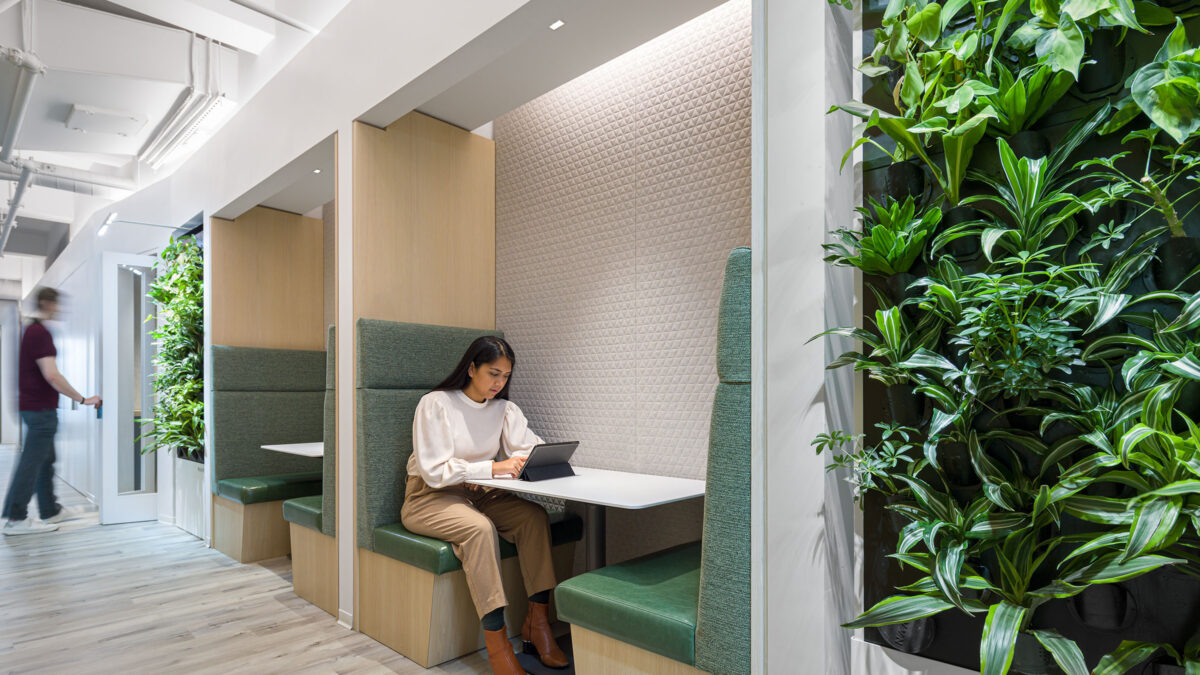 person working in booth