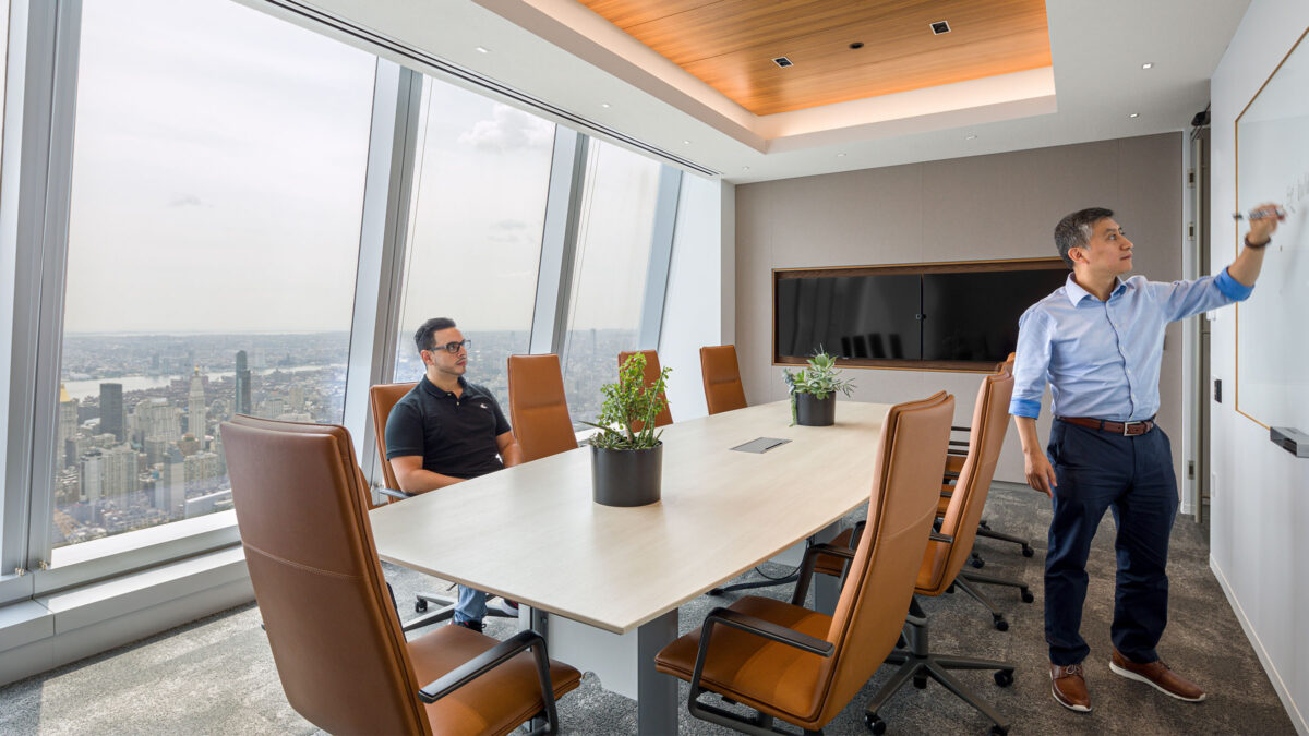 people working in meeting room