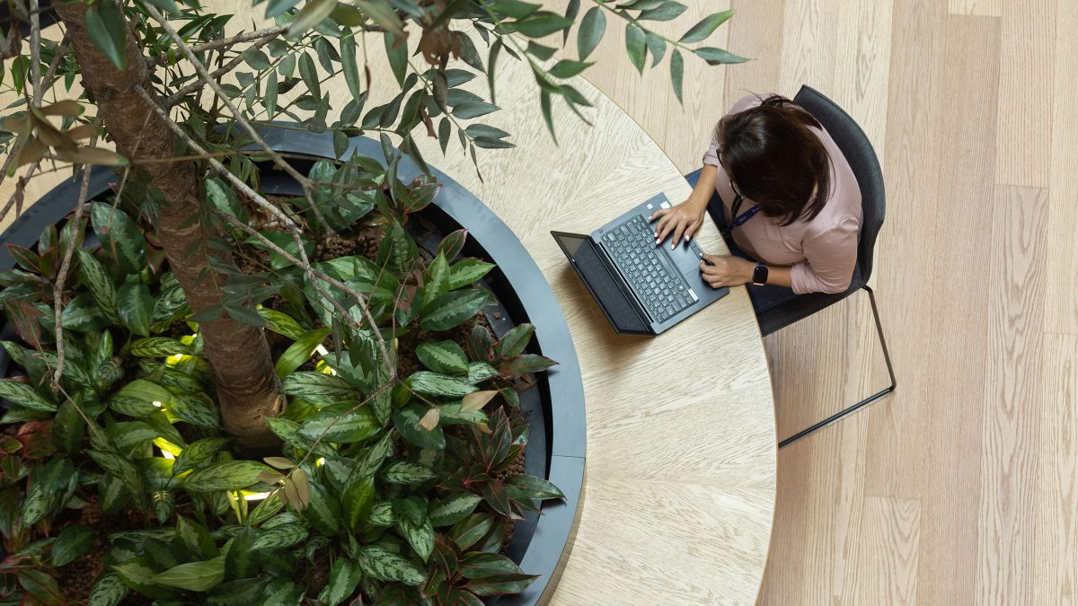 person working in atrium