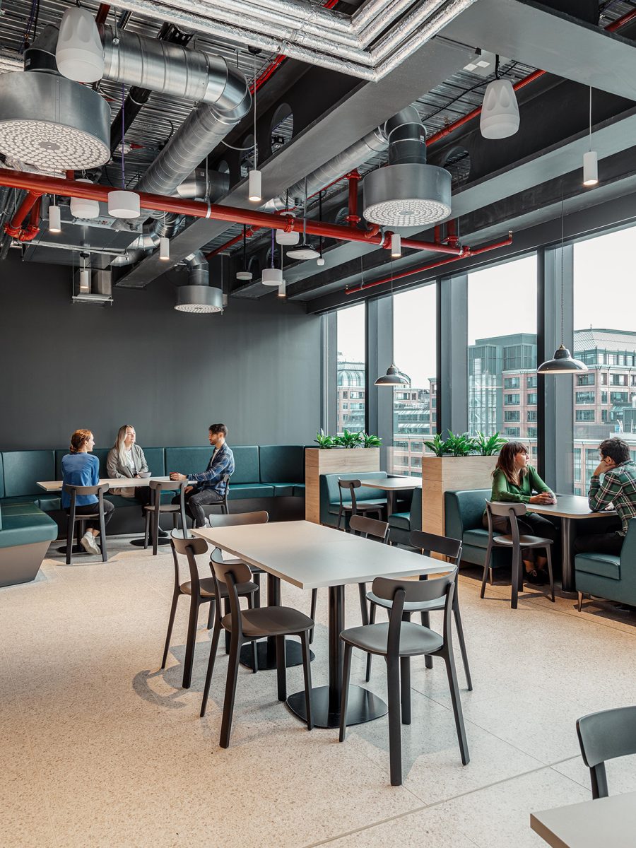 View of cafe seating in office design in London for HRT