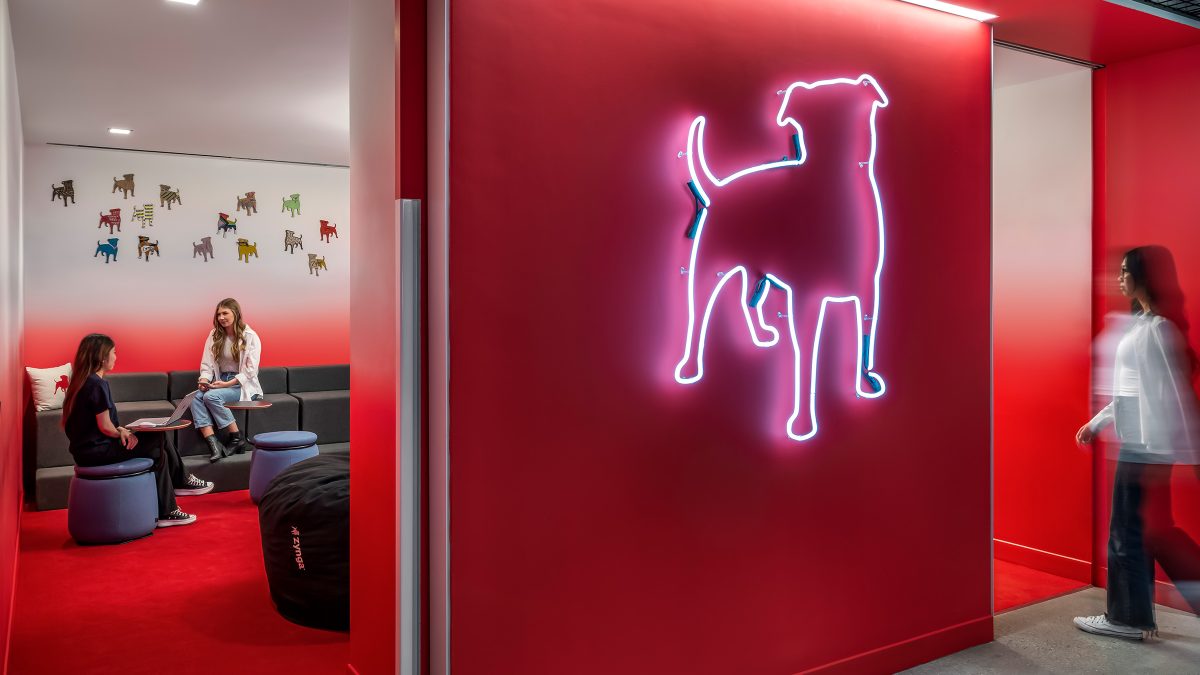 Each area of Zynga’s office space is a vibrant display of its brand, including colourful meeting rooms and neon signage.