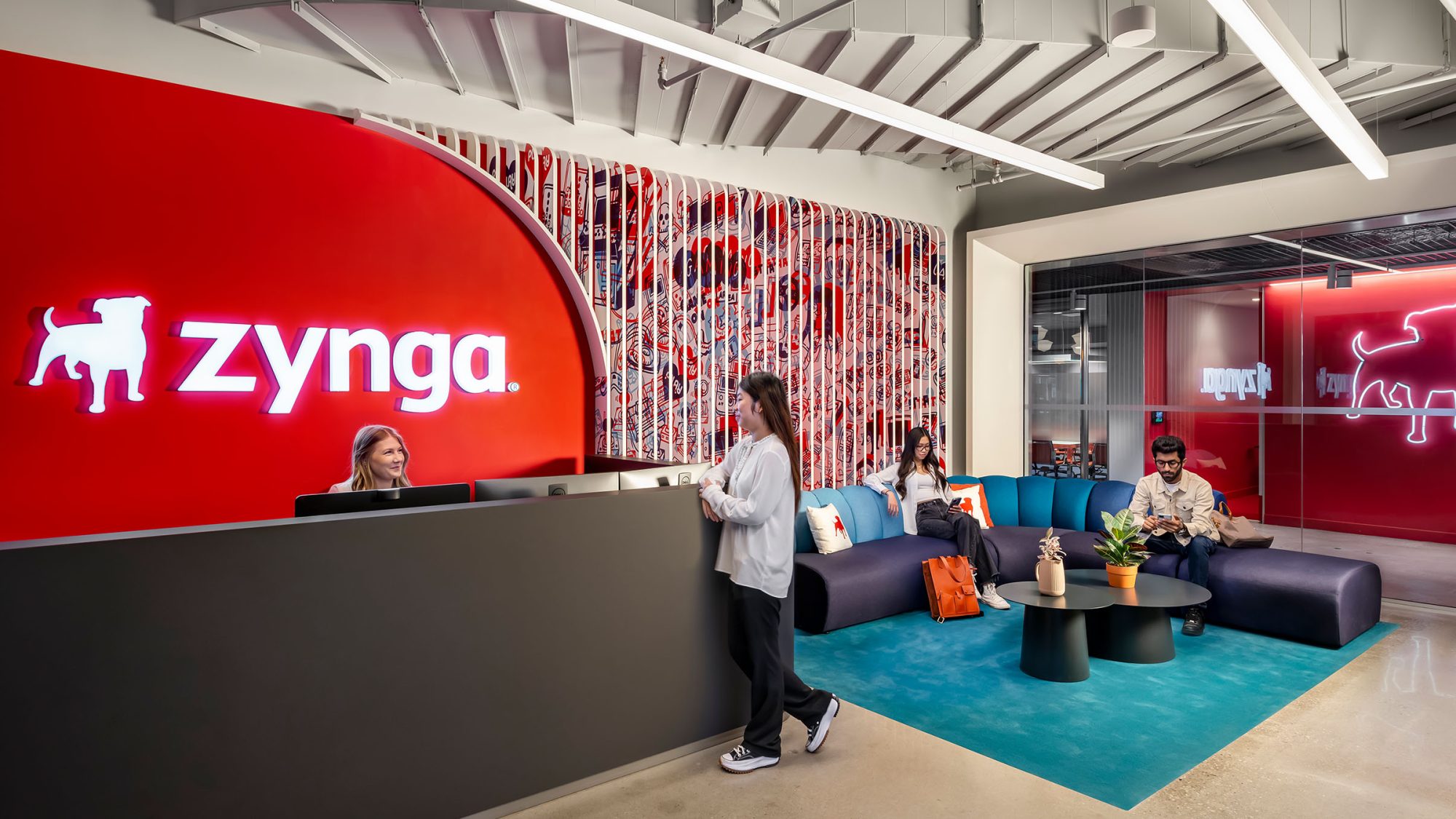 M Moser’s office design for Zynga leads with an inviting, fully branded reception area, including comfortable seating for guests and employees.