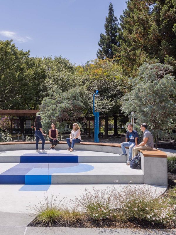 people sitting in landscape architectural seating