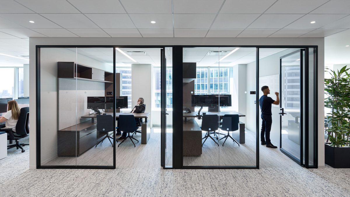 Office design in New York featuring how space can be broken up by inserting smaller meeting rooms and offices.