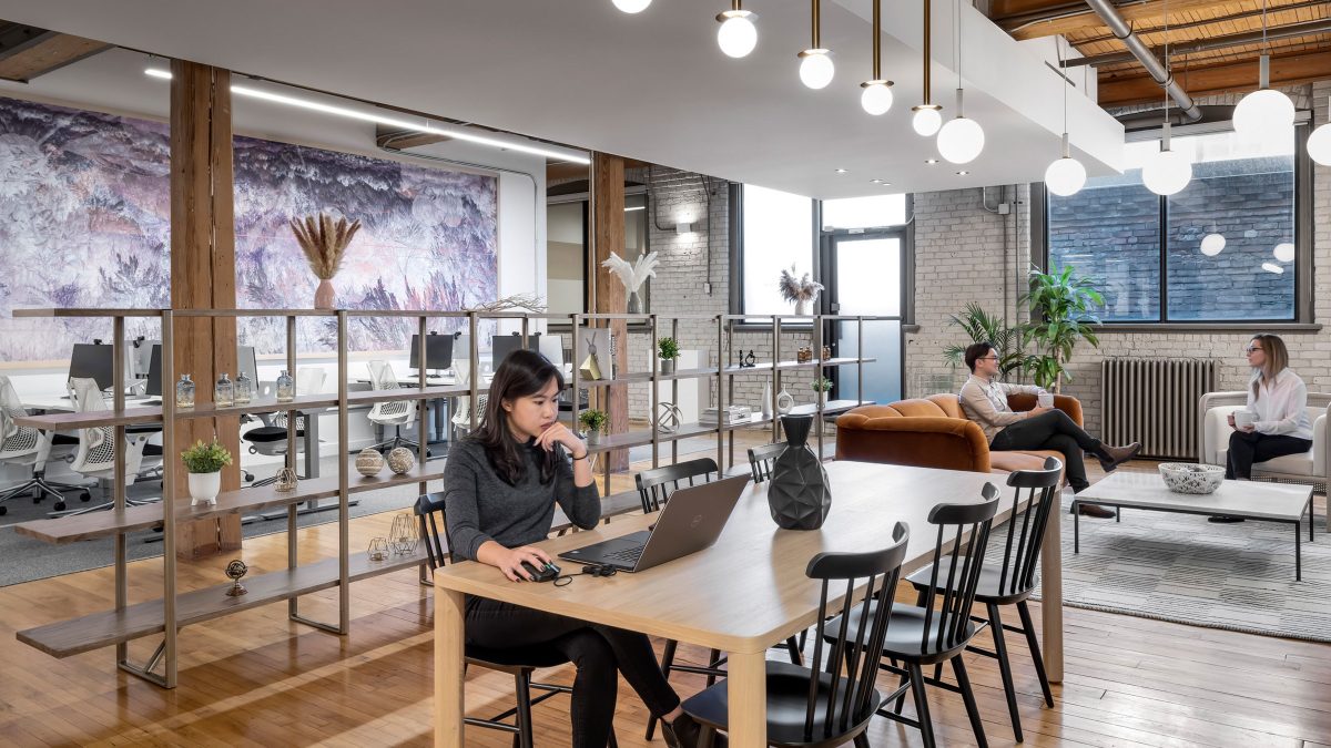 Interior design for corporate office in Toronto featuring comfortable furniture and various work setting for private and collaborative work. 