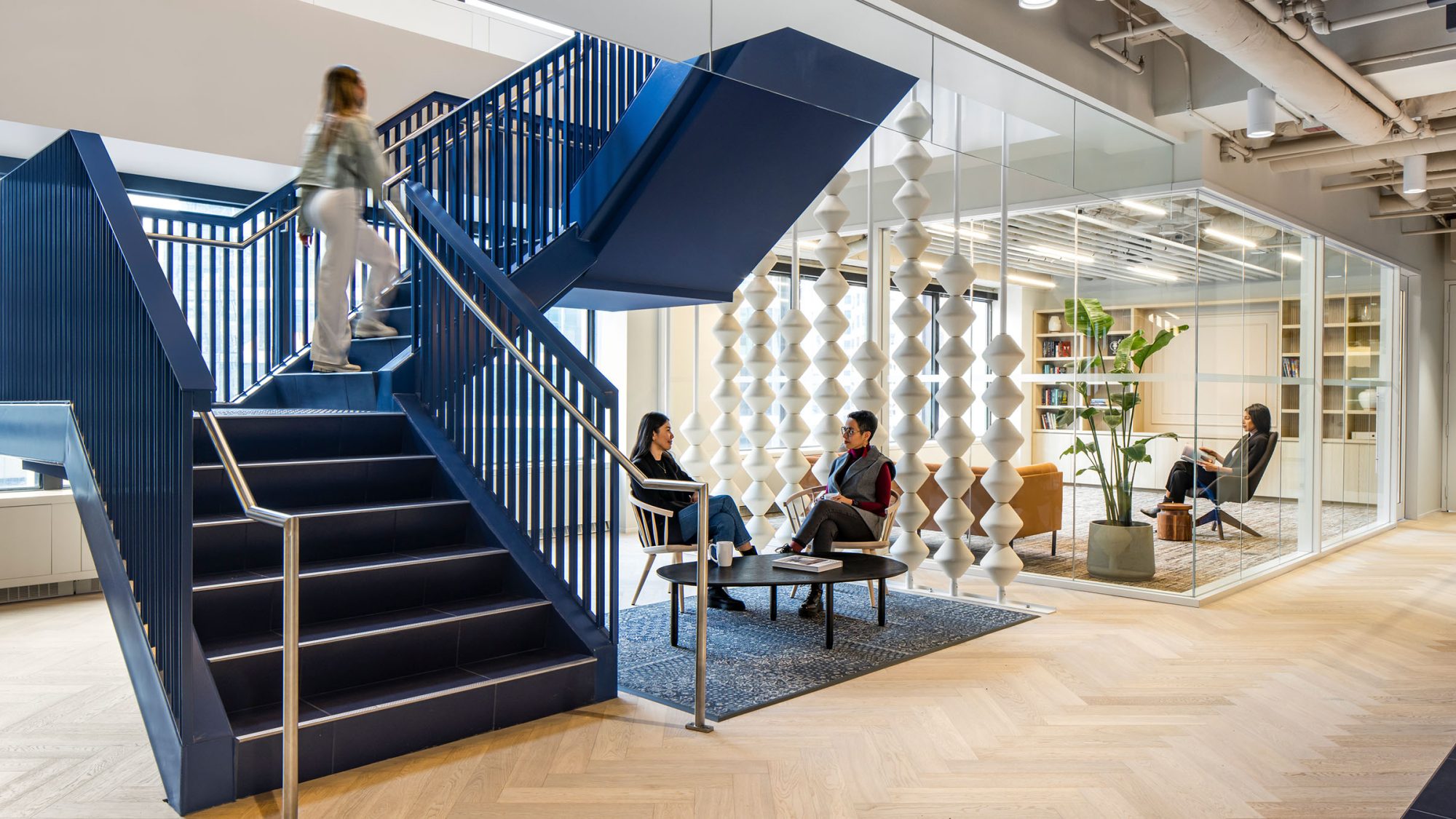 Office design for Tipalti in Vancouver by M Moser Associates featuring a repurposed staircase and enjoyable employee experience.