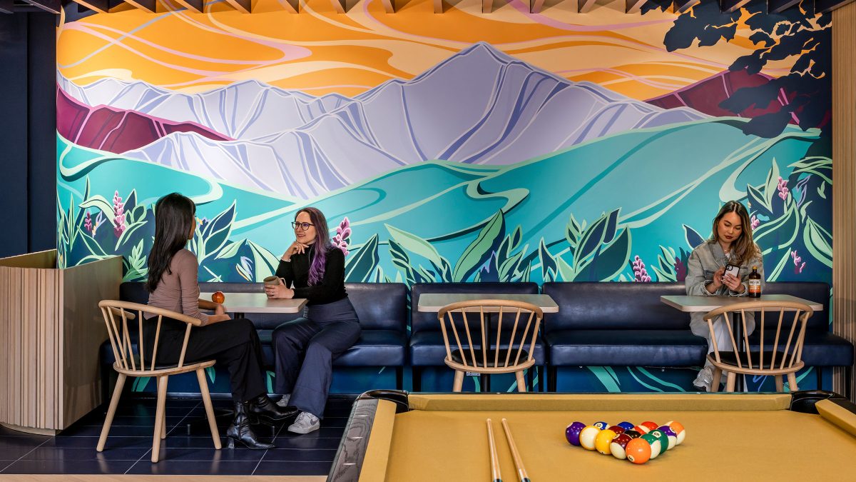 Hand-painted mural by local British Columba artist Jessa Gilbert featuring a beautiful array of colours depicting the North Shore mountains in Vancouver, Canada.