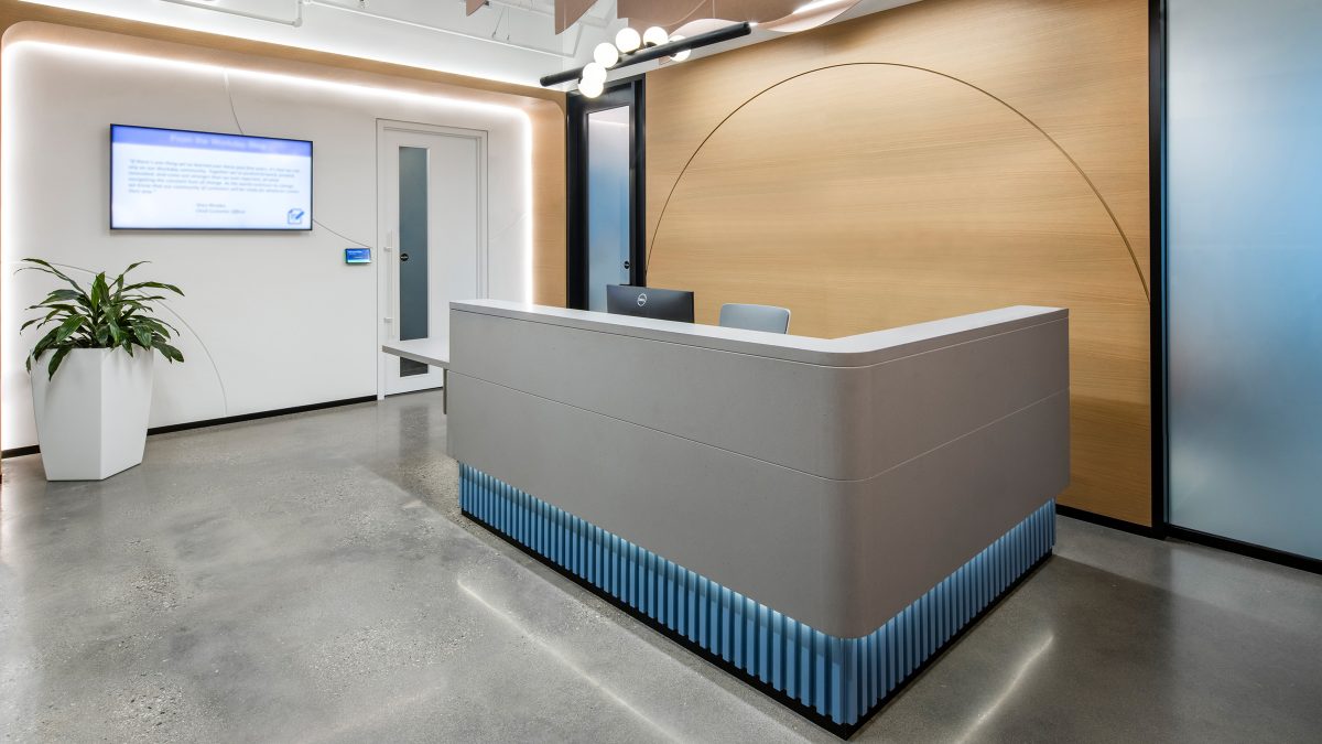 Vancouver corporate office depicting a branded entryway and welcoming reception desk.