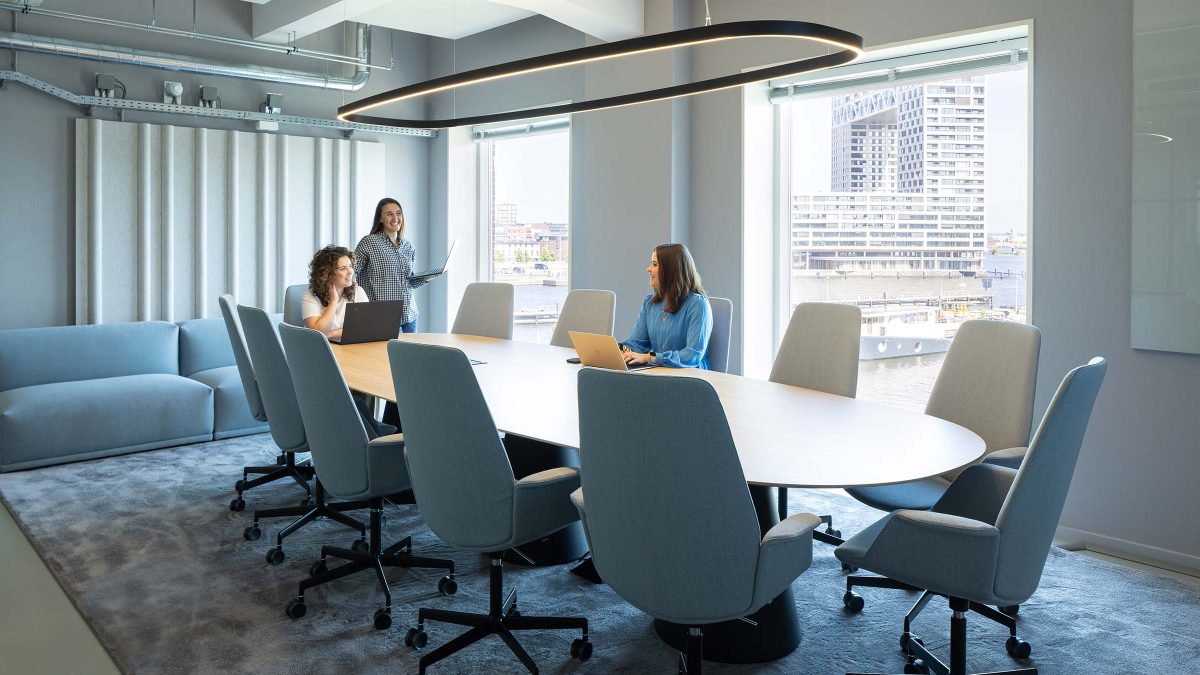 Boardroom space in calming colour palette.