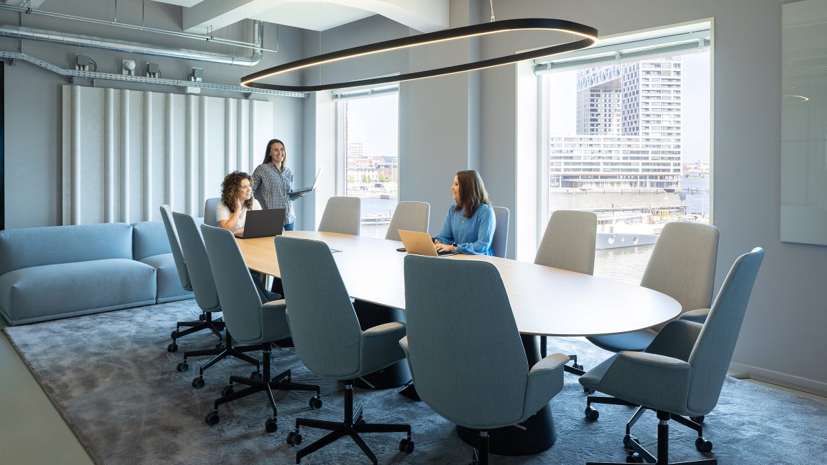 Boardroom space in calming colour palette.