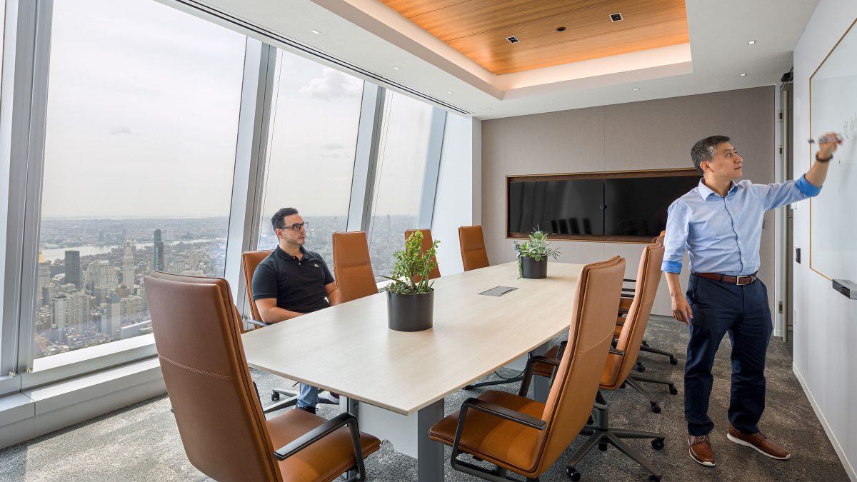 man giving presentation to colleague