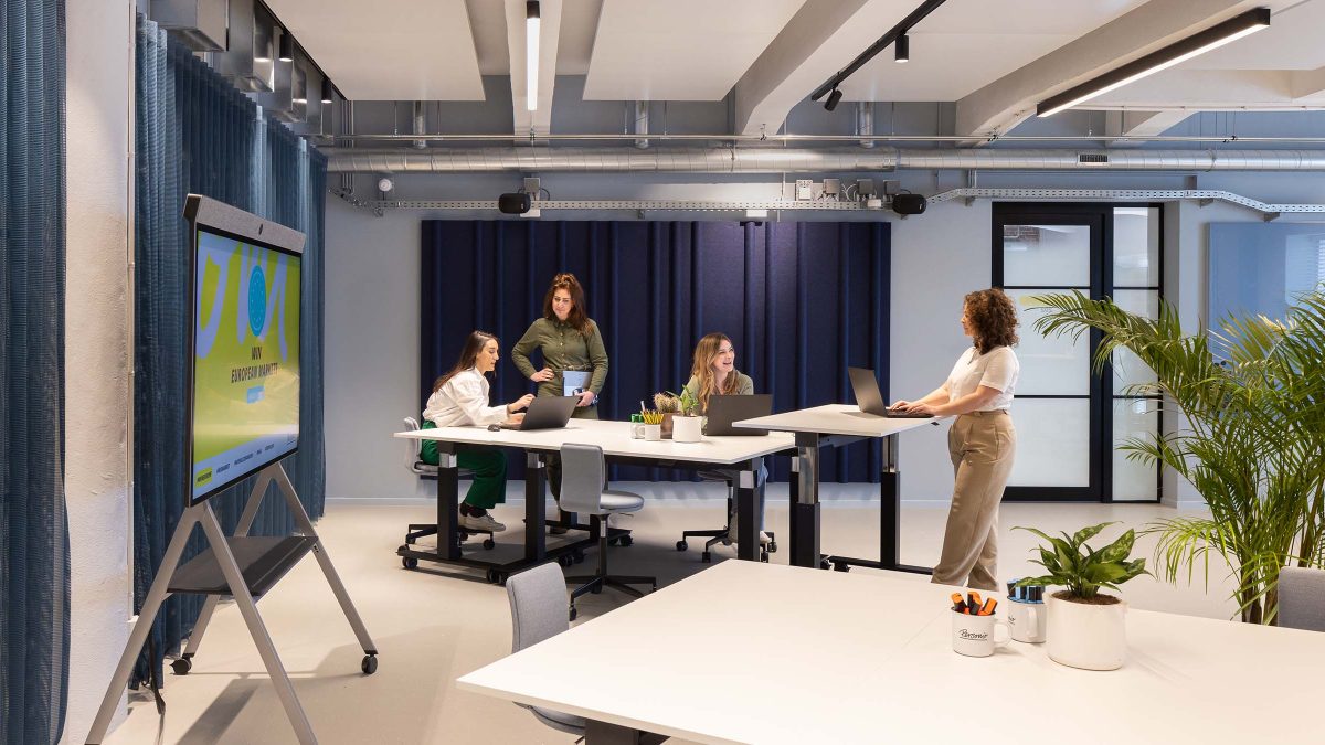 M Moser’s completed project for Personio in Amsterdam featuring an open team collaboration area with supportive workplace design.