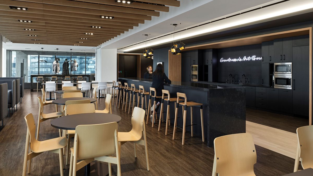 Corporate kitchen design in Toronto featuring hospitality layout and comfortable seating.