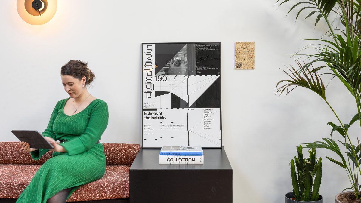 person-sat-on-baquette-seating-next-to-bespoke-artwork-at-M-Moser-Amsterdam-studio