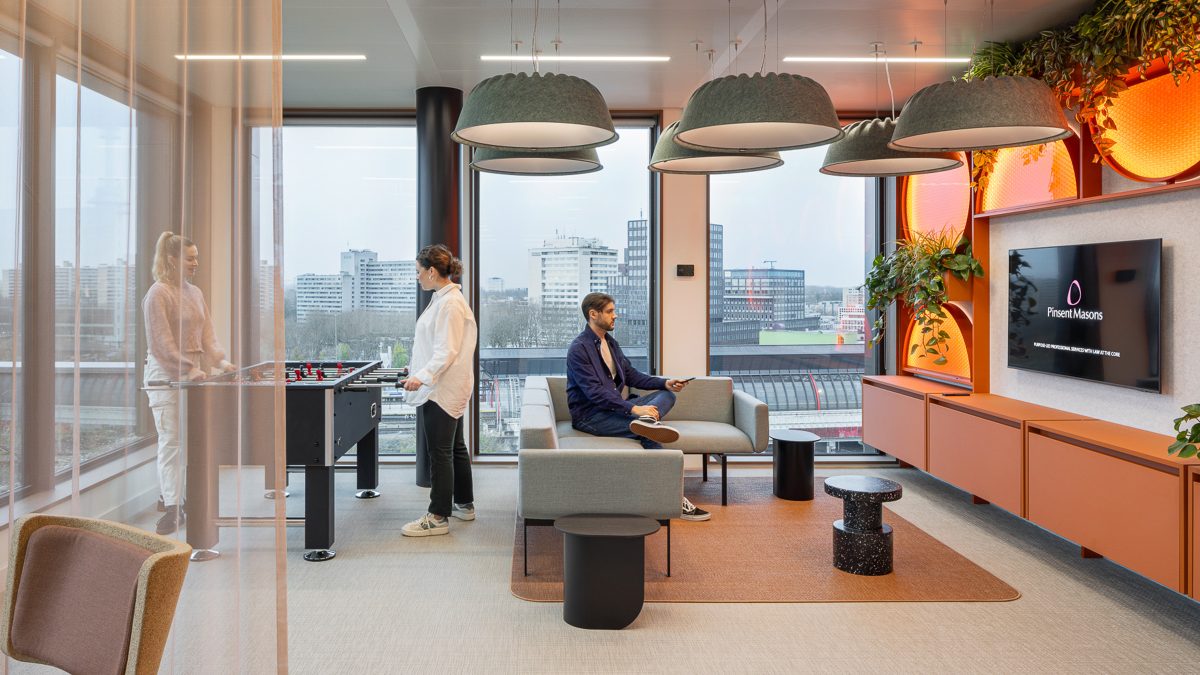 people-socialising-in-the-games-room-in-pinsent-masons-amsterdam-office