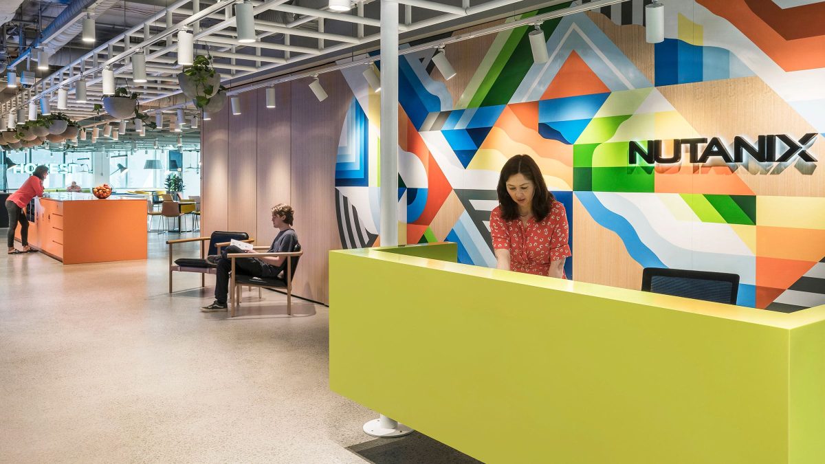 woman behind reception desk