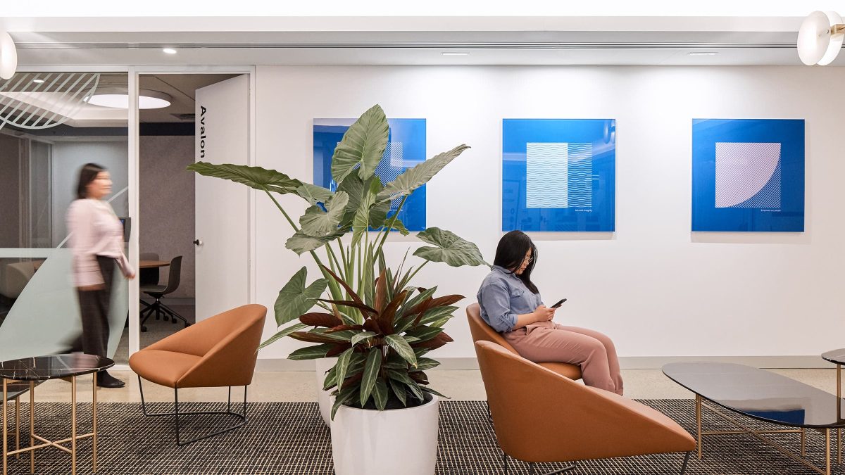 woman waiting by plants