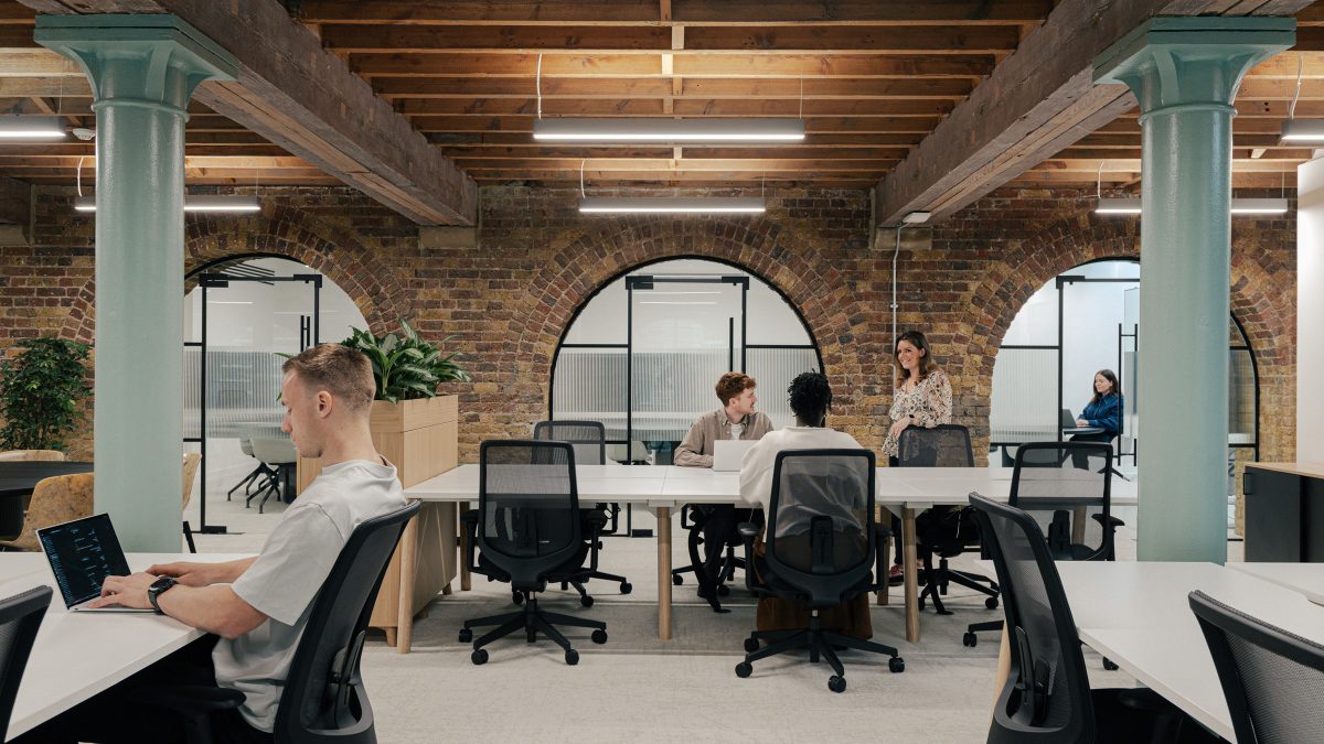 people-working-at-desks-in-industrial-setting-within-knotel-tenant-ready-space