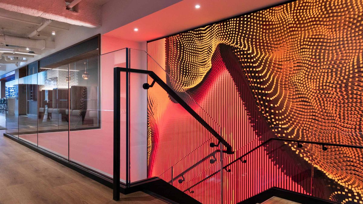 digital-wall-design-red-glow-in-staircase