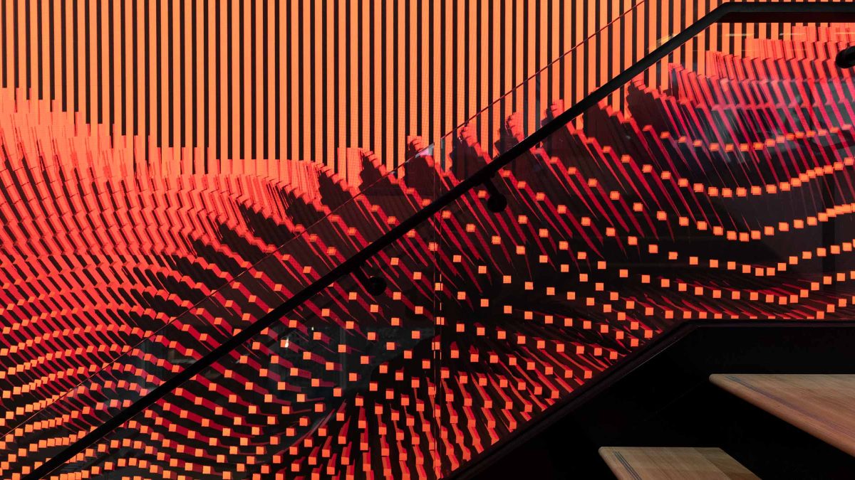 digital-screen-red-graphics-in-stairwell