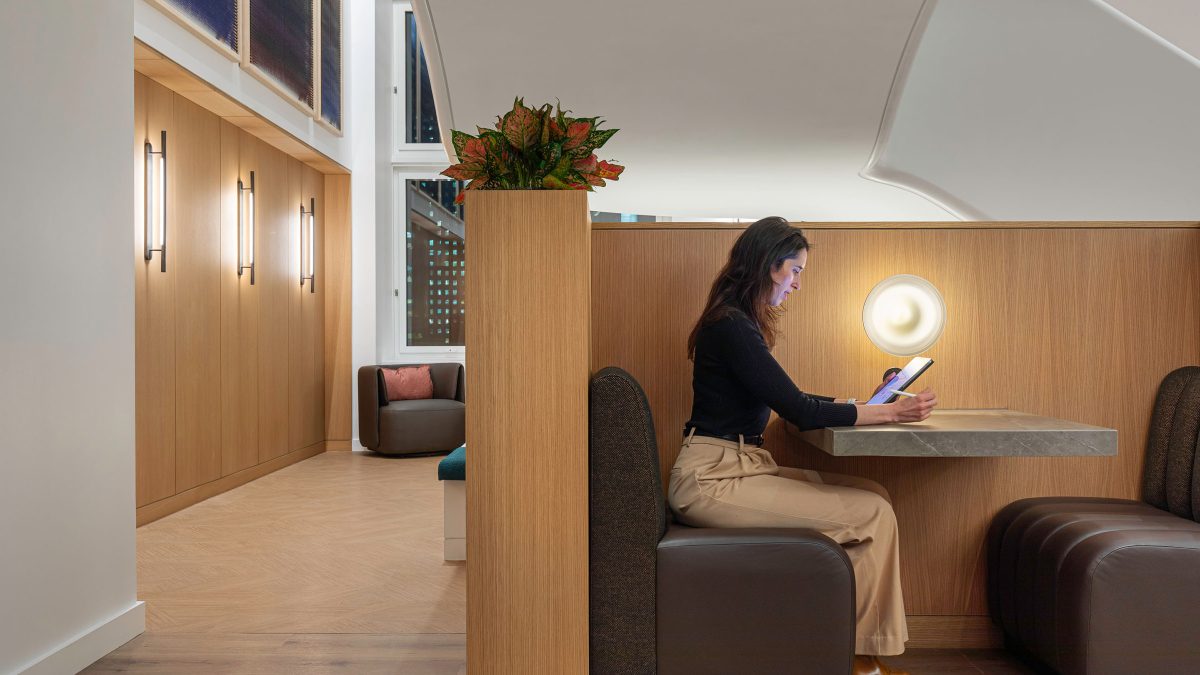 workplace-interior-design-new-york-work-nook-woman-focusing