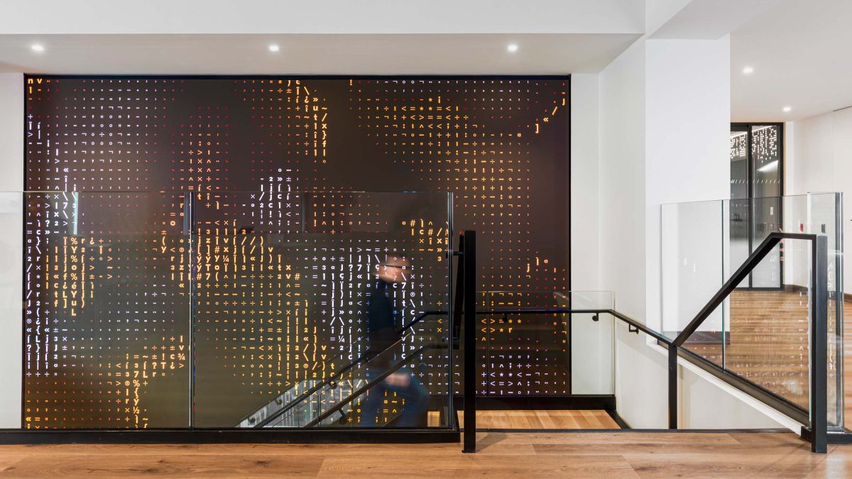 digital-wall-man-walking-up-stairs