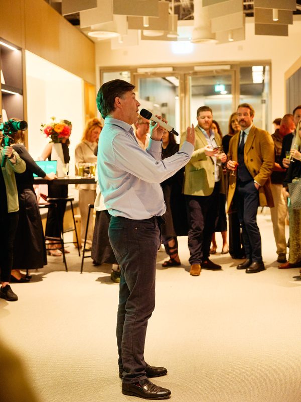 Charlie Millard presenting at the LLL party