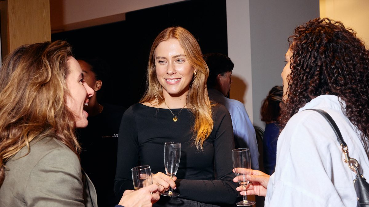 Guests at the LLL party chatting