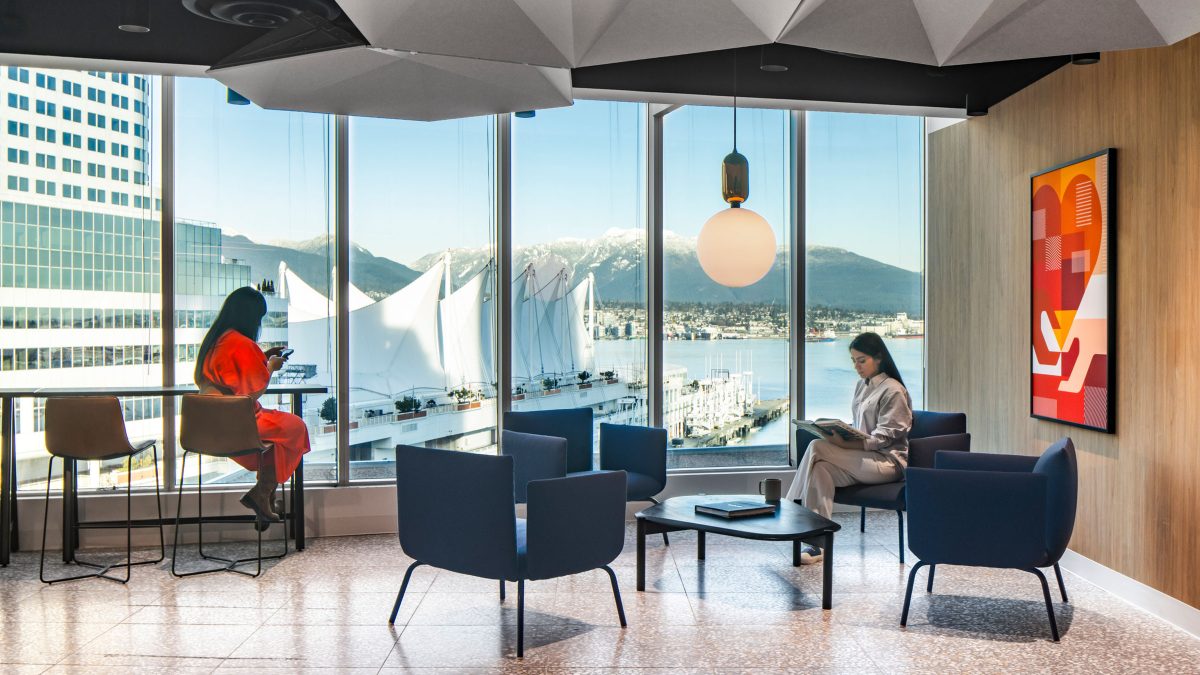 navigating-a-new-workplace-causal-setting-two-women-sitting