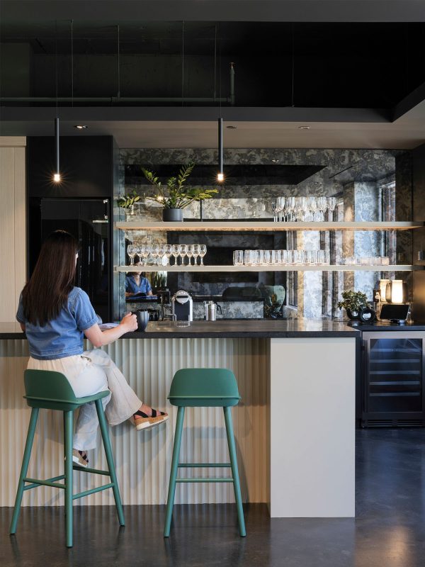 mmoser-confidential-client-vancouver-workplace-interior-cafe-and-event-space-woman-sitting
