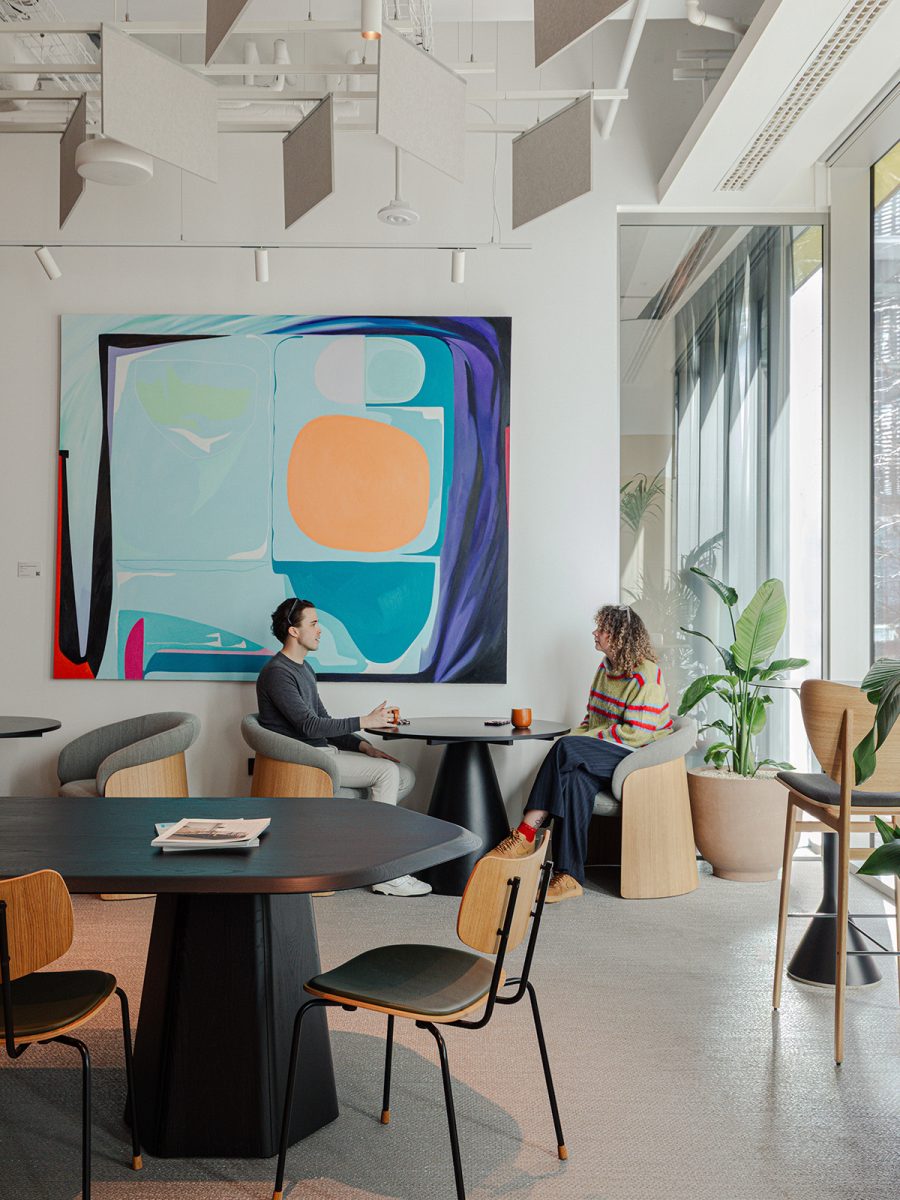 colourful-art-and-brand-expression-cafe-workplace-two-people-working