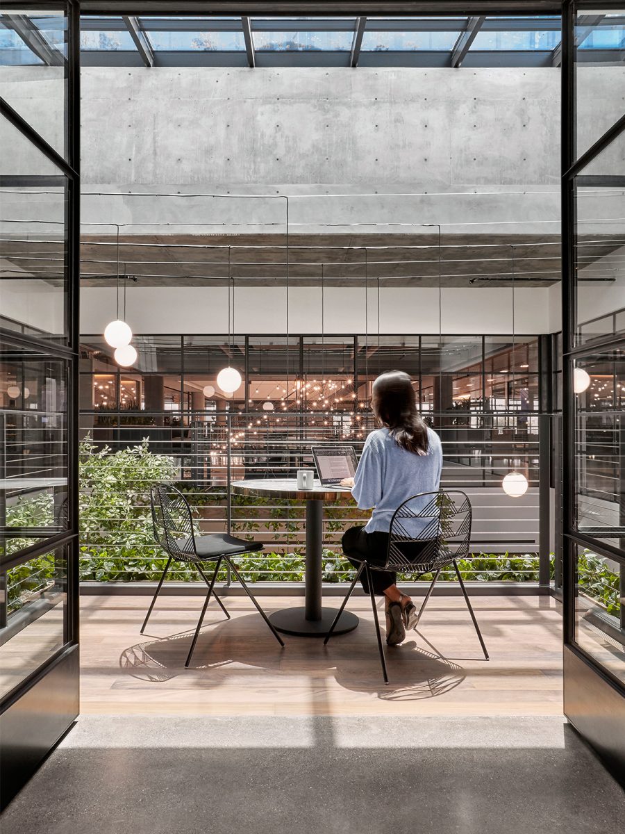 private-work-area-balcony-woman-working