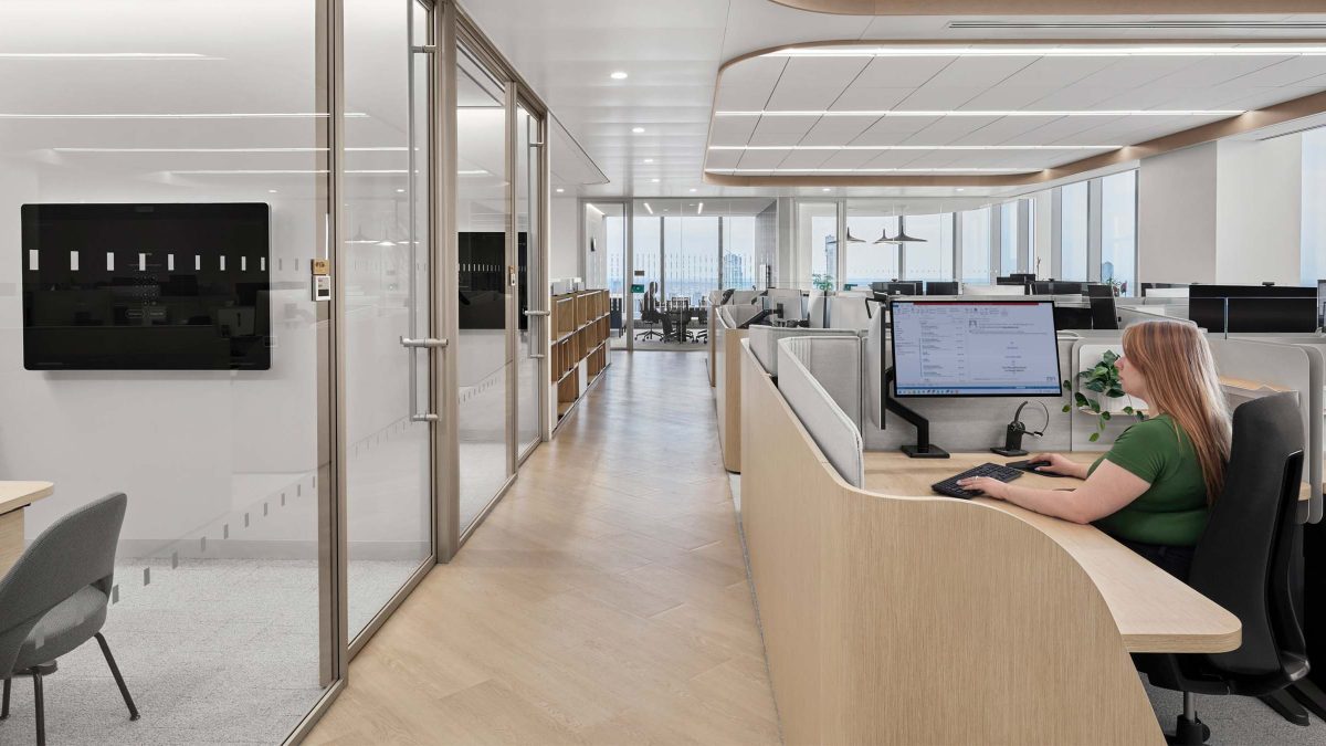 workplace-interior-work-station-woman-sitting-at-computer