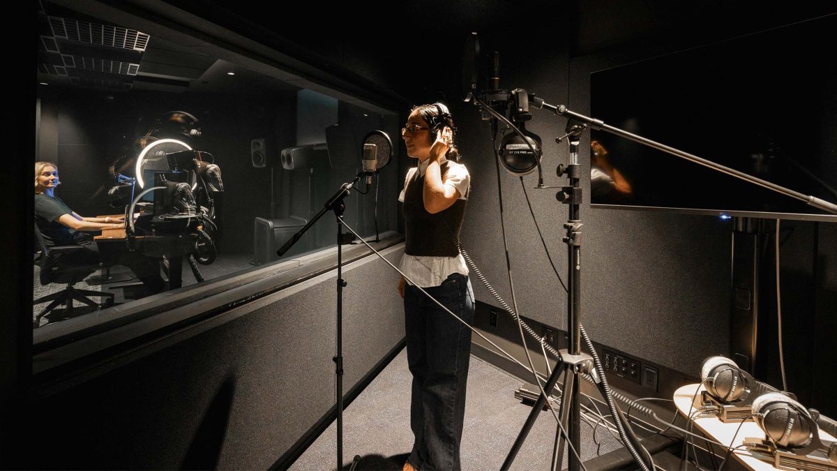 mmoser-confidential-client-montreal-workplace-interior-sound-mixing-studio-design-woman-talking-into-mic