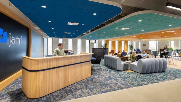 mmoser-jamf-software-minneapolis-workplace-design-interior-reception-area-man-at-desk