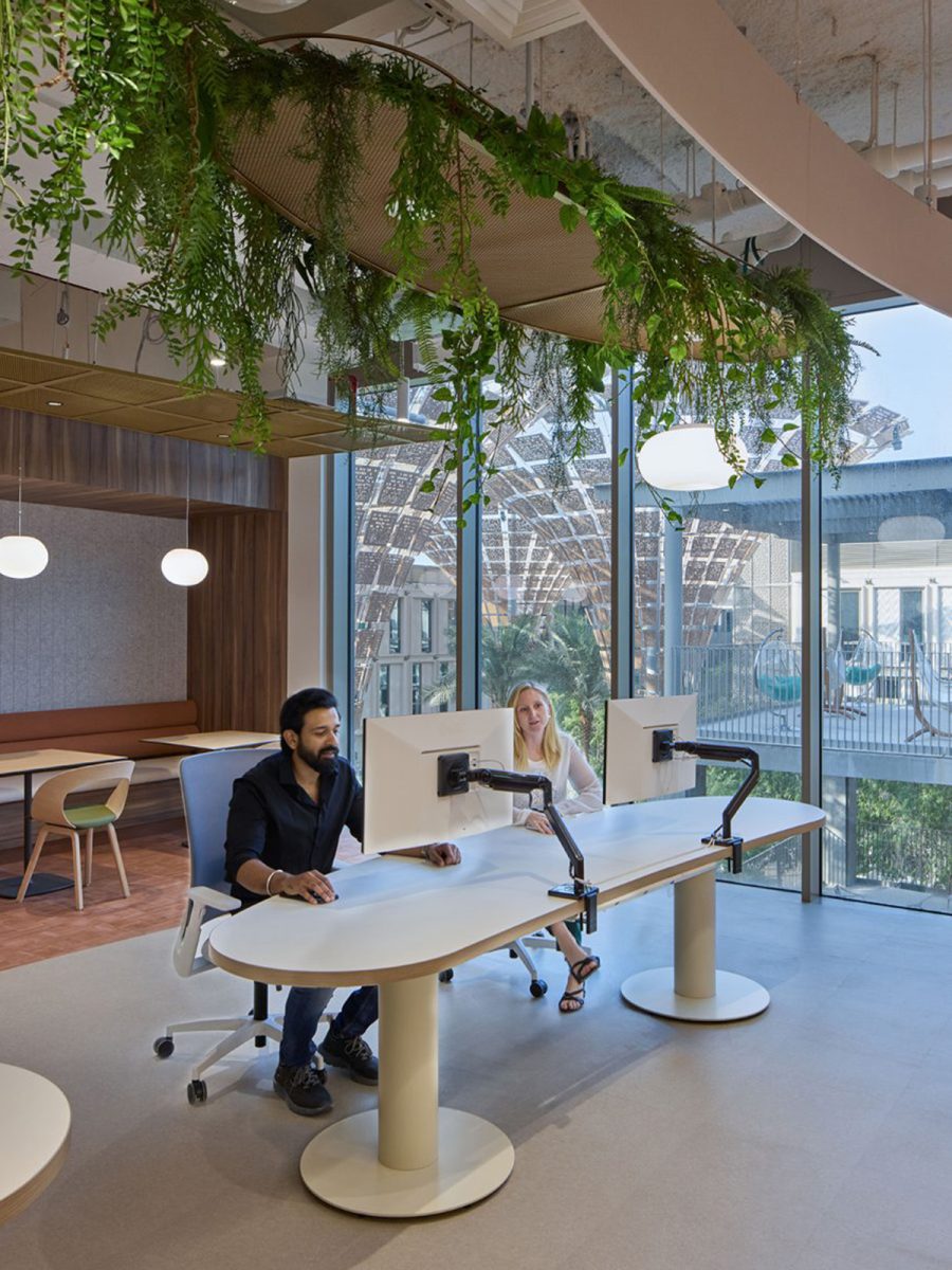people-working-at-desk-with-views-o-expo-city-dubai